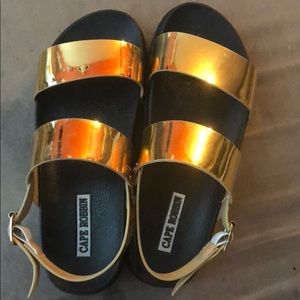 Black and gold sandals